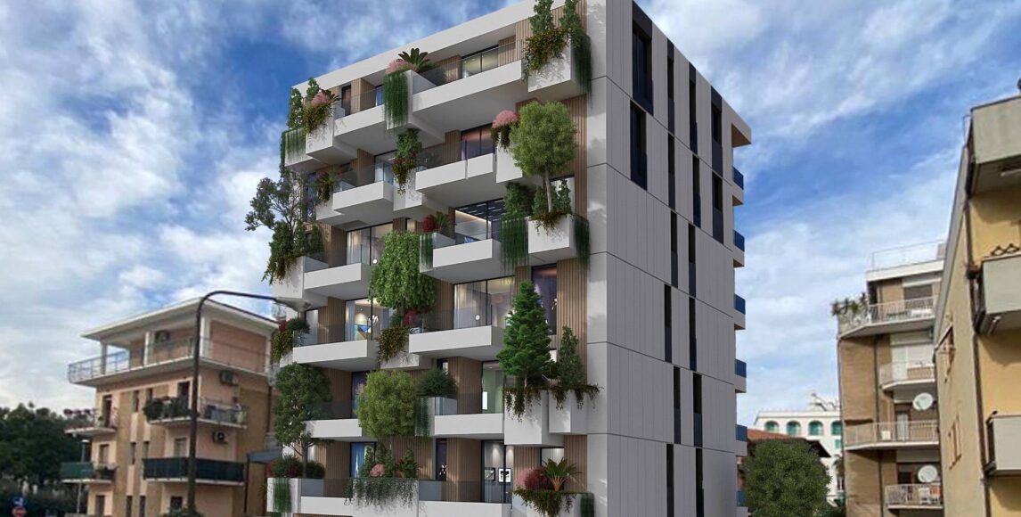 Modern apartmanok zöld homlokzattal közvetlenül a tengerparton